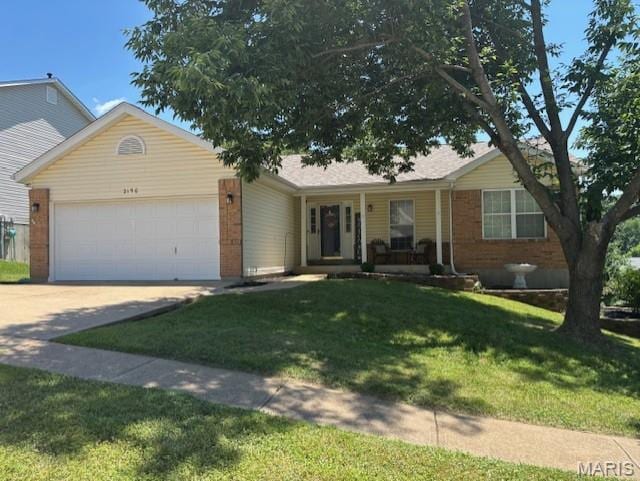 2150 San Simeon Dr, Arnold, MO 63010 - single story home with a garage, brick siding, a front yard, concrete driveway, and a porch