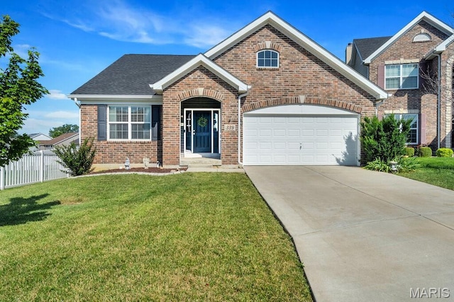 339 Cambridgeshire Ct, Saint Peters, MO 63376 - traditional-style home featuring brick siding, an attached garage, driveway, and roof with shingles
