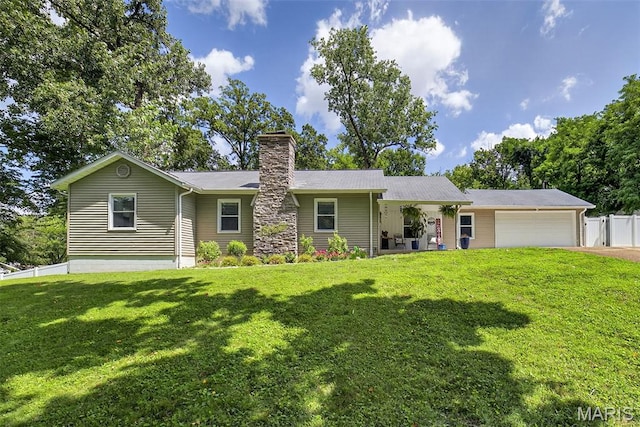11365 Inverness Ln, Maryland Heights, MO 63043 - ranch-style home featuring a chimney, an attached garage, and driveway