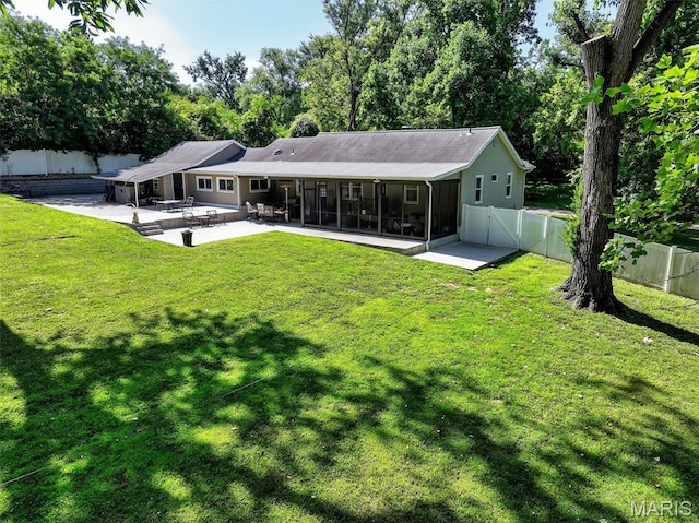 11365 Inverness Ln, Maryland Heights, MO 63043 - rear view of house featuring a sunroom, a patio area, a fenced backyard, and a gate