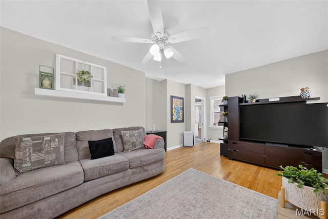 11365 Inverness Ln, Maryland Heights, MO 63043 - living area with wood finished floors and ceiling fan