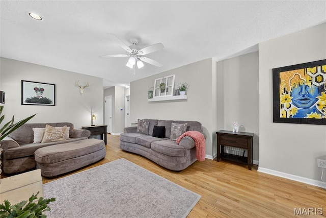 11365 Inverness Ln, Maryland Heights, MO 63043 - living room featuring a ceiling fan, light wood finished floors, and recessed lighting