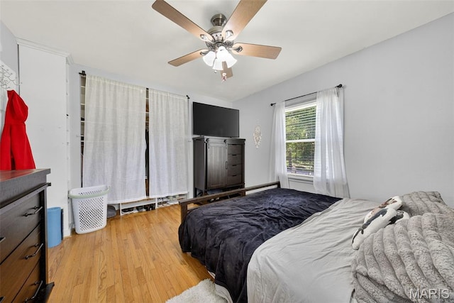 11365 Inverness Ln, Maryland Heights, MO 63043 - bedroom featuring light wood-type flooring and ceiling fan