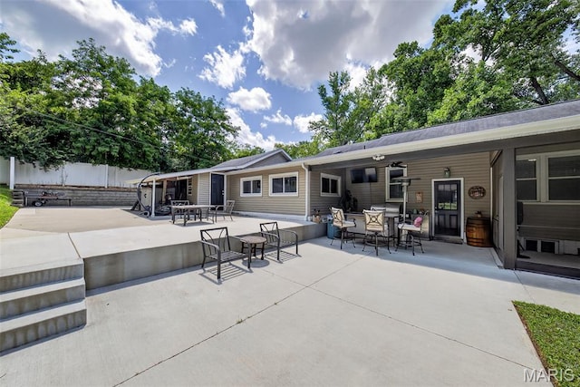 11365 Inverness Ln, Maryland Heights, MO 63043 - rear view of house with a patio and outdoor dining space