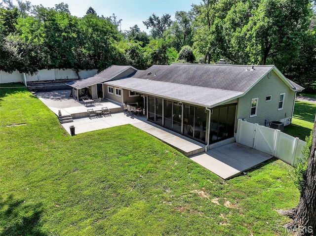 11365 Inverness Ln, Maryland Heights, MO 63043 - rear view of house with a sunroom, a patio, a fenced backyard, and a gate