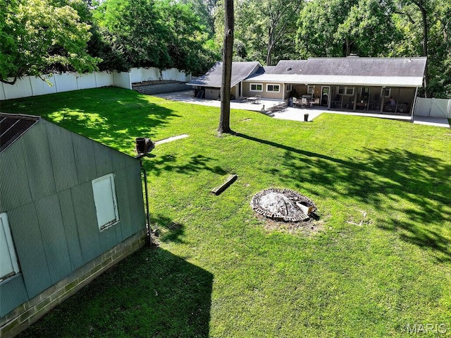 11365 Inverness Ln, Maryland Heights, MO 63043 - fenced backyard featuring a patio and a sunroom