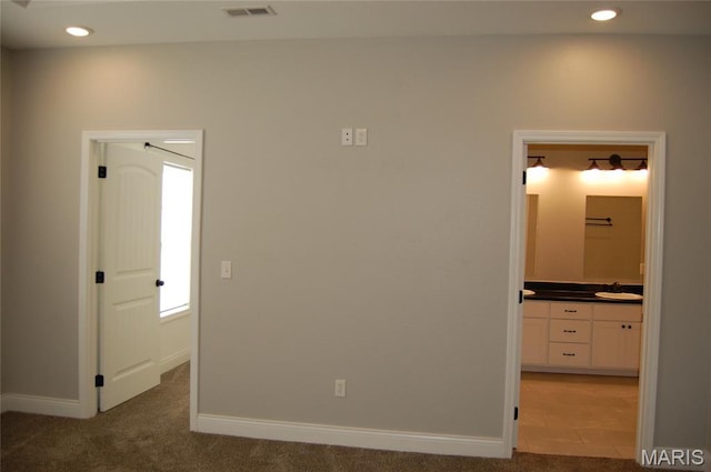 1002 E Donna Dr, Poplar Bluff, MO 63901 - empty room with recessed lighting and light colored carpet