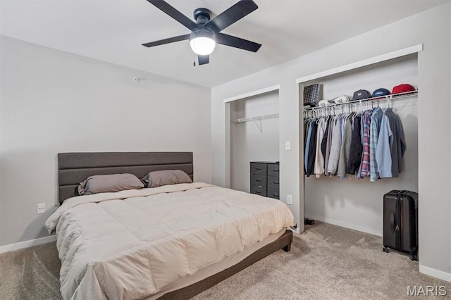 200 S Kirkwood Rd Unit 317, Kirkwood, MO 63122 - carpeted bedroom featuring multiple closets and a ceiling fan