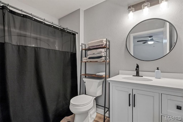 200 S Kirkwood Rd Unit 317, Kirkwood, MO 63122 - full bathroom featuring a ceiling fan, vanity, wood finished floors, and a shower with shower curtain