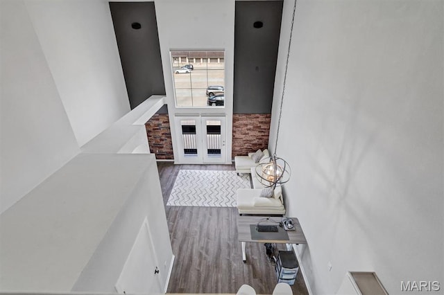 200 S Kirkwood Rd Unit 317, Kirkwood, MO 63122 - hallway featuring wood finished floors and french doors