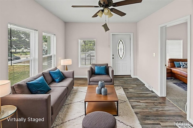 208 Washington Ave, East Alton, IL 62024 - living area featuring a ceiling fan and dark wood-type flooring