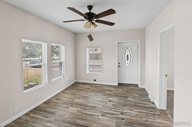208 Washington Ave, East Alton, IL 62024 - entryway featuring a ceiling fan, wood finished floors, and a textured ceiling