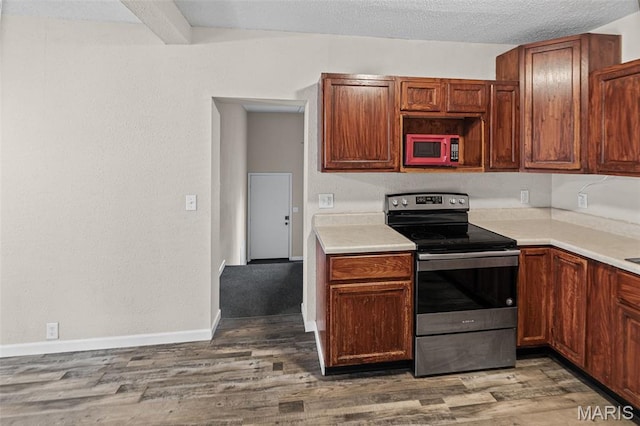 208 Washington Ave, East Alton, IL 62024 - kitchen with electric range, light countertops, wood finished floors, and a textured ceiling