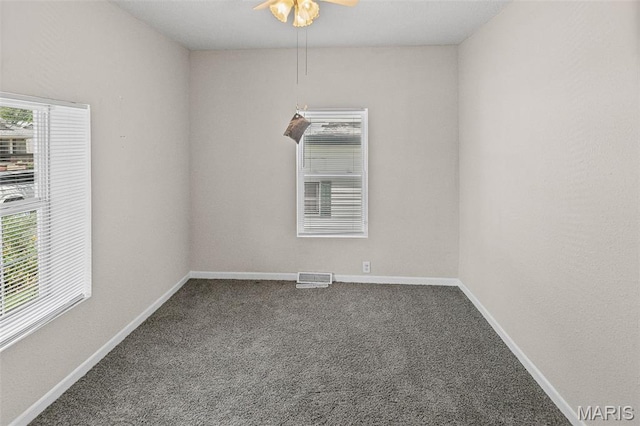 208 Washington Ave, East Alton, IL 62024 - unfurnished room featuring carpet flooring and ceiling fan