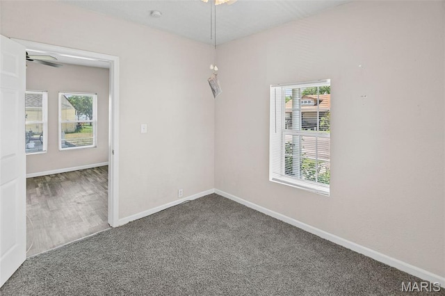 208 Washington Ave, East Alton, IL 62024 - spare room with ceiling fan and carpet