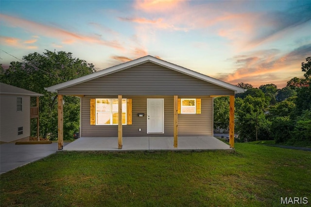 600 Allen Place, De Soto, MO 63020 - rear view of property featuring a yard and covered porch