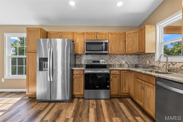 600 Allen Place, De Soto, MO 63020 - kitchen featuring stainless steel appliances, backsplash, dark wood-style floors, light stone counters, and recessed lighting