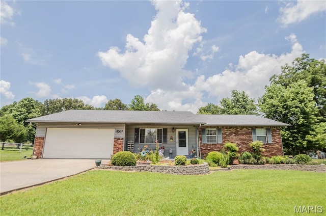 5707 Cedar Rdg, Poplar Bluff, MO 63901 - ranch-style home featuring an attached garage, driveway, a front lawn, and brick siding
