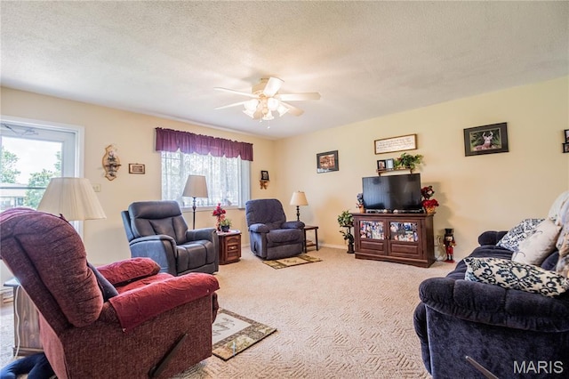 5707 Cedar Rdg, Poplar Bluff, MO 63901 - living room featuring a ceiling fan, carpet, and a textured ceiling