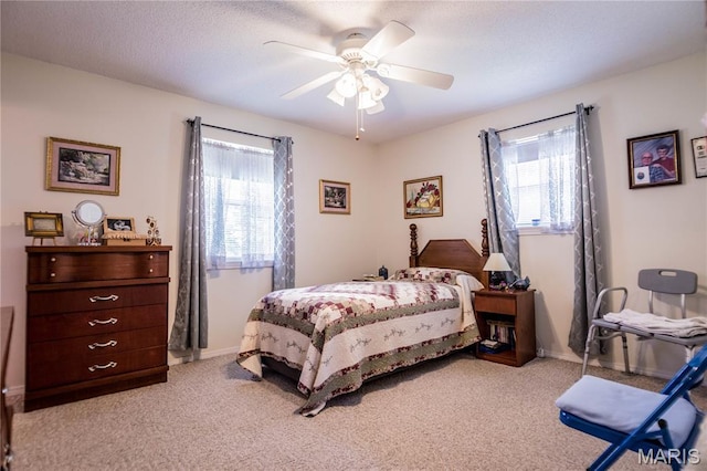 5707 Cedar Rdg, Poplar Bluff, MO 63901 - bedroom featuring multiple windows, light colored carpet, and ceiling fan