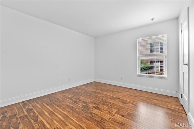 149 Jubilee Hill Dr Unit A, Wildwood, MO 63040 - spare room with wood finished floors and baseboards