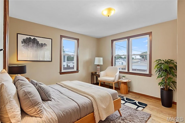 6312 Bradley Ave, Saint Louis, MO 63139 - bedroom featuring wood finished floors and baseboards