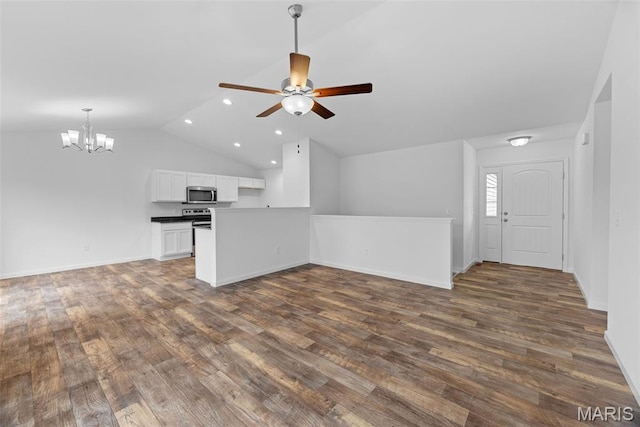 906 Gimli Ln, Wright City, MO 63390 - unfurnished living room with vaulted ceiling, a chandelier, dark wood-type flooring, recessed lighting, and ceiling fan
