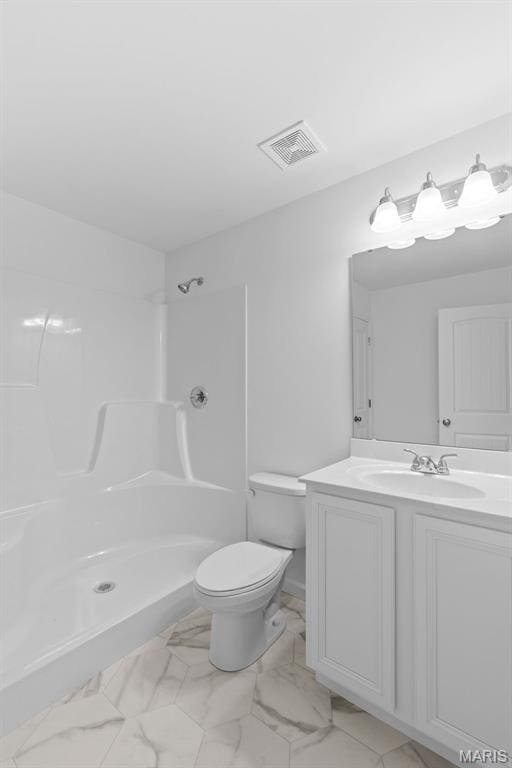906 Gimli Ln, Wright City, MO 63390 - bathroom with vanity, marble look tiles, and a shower