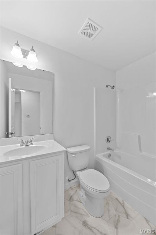 906 Gimli Ln, Wright City, MO 63390 - full bath featuring marble finish flooring, bathtub / shower combination, and vanity