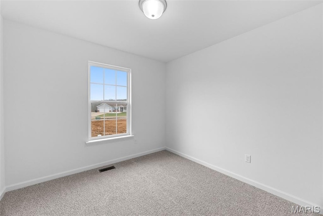 906 Gimli Ln, Wright City, MO 63390 - empty room featuring carpet flooring and baseboards