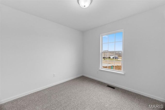 906 Gimli Ln, Wright City, MO 63390 - carpeted empty room with baseboards