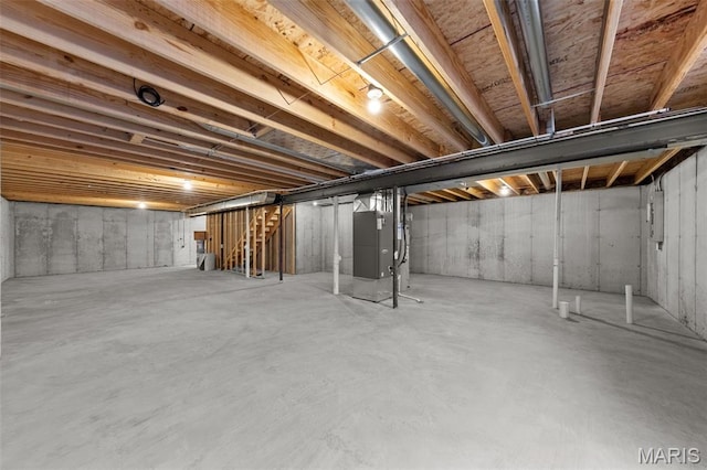 906 Gimli Ln, Wright City, MO 63390 - unfinished basement featuring electric panel and heating unit