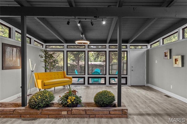 1562 Starlight Dr, Saint Louis, MO 63135 - unfurnished sunroom with track lighting and beamed ceiling