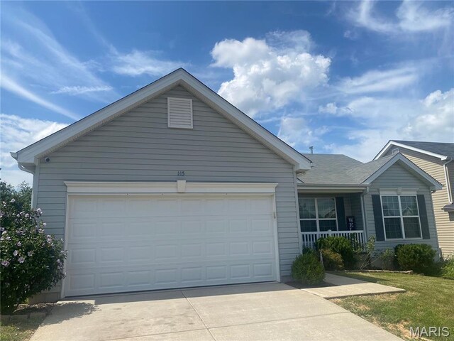 145 Champions Ln, Wentzville, MO 63385 - ranch-style home with driveway, a porch, and a garage