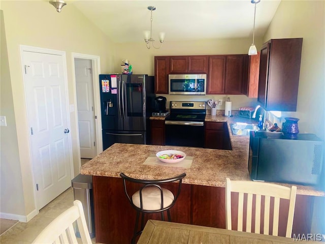 145 Champions Ln, Wentzville, MO 63385 - kitchen featuring stainless steel appliances, a peninsula, hanging light fixtures, a chandelier, and lofted ceiling