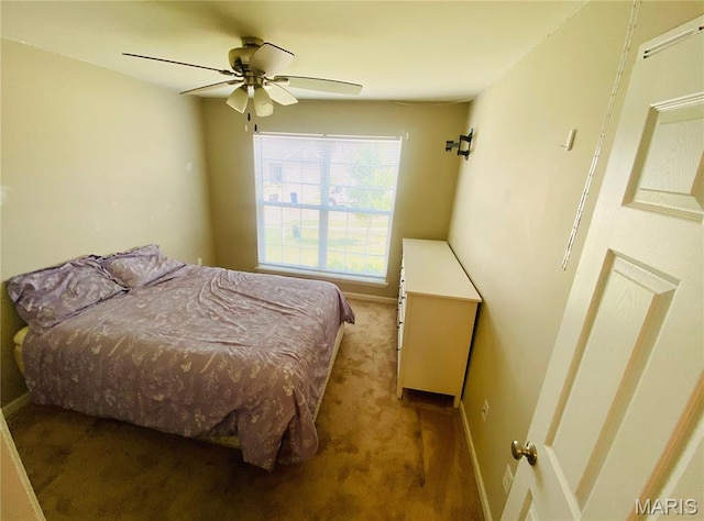 145 Champions Ln, Wentzville, MO 63385 - carpeted bedroom featuring baseboards and ceiling fan