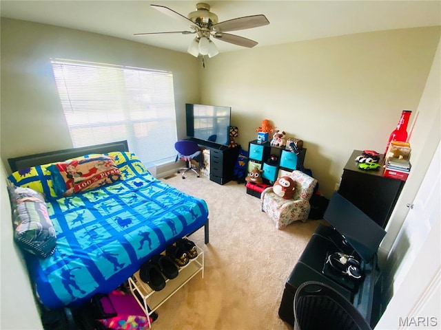 145 Champions Ln, Wentzville, MO 63385 - carpeted bedroom featuring a ceiling fan
