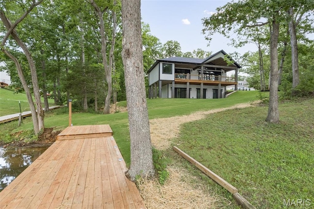 10028 Debbie Pl, Bonne Terre, MO 63628 - rear view of house with a yard and a wooden deck