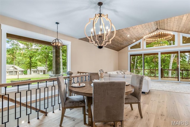 10028 Debbie Pl, Bonne Terre, MO 63628 - dining area with a chandelier, hardwood / wood-style floors, and vaulted ceiling