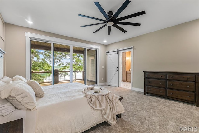 10028 Debbie Pl, Bonne Terre, MO 63628 - carpeted bedroom featuring a barn door, access to exterior, recessed lighting, ensuite bath, and ceiling fan