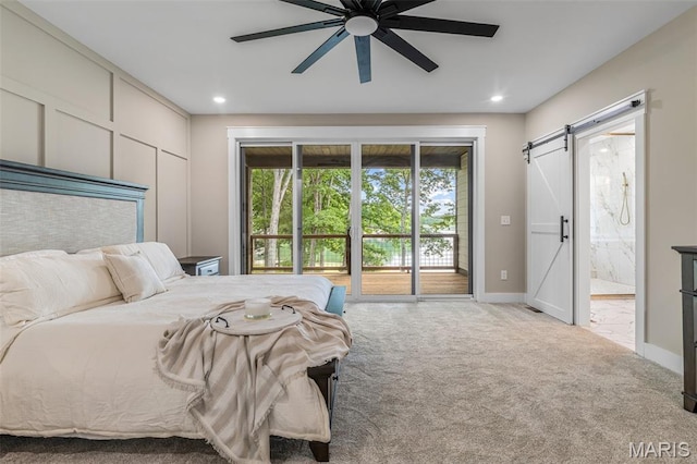 10028 Debbie Pl, Bonne Terre, MO 63628 - carpeted bedroom with access to outside, a barn door, ensuite bathroom, a ceiling fan, and recessed lighting