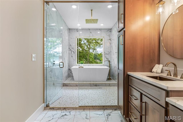 10028 Debbie Pl, Bonne Terre, MO 63628 - full bathroom featuring marble look tiles, a marble finish shower, a freestanding bath, and vanity