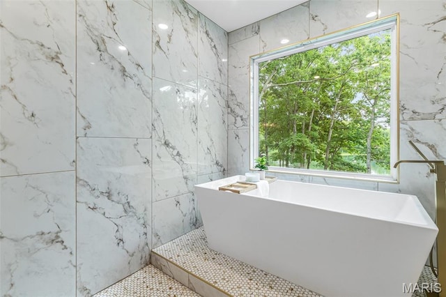 10028 Debbie Pl, Bonne Terre, MO 63628 - full bathroom with a freestanding tub and tile walls