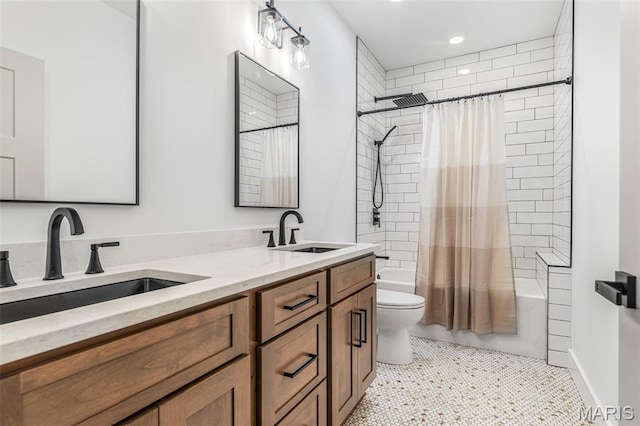 10028 Debbie Pl, Bonne Terre, MO 63628 - bathroom with double vanity, shower / tub combo, and recessed lighting