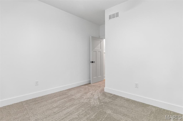10028 Debbie Pl, Bonne Terre, MO 63628 - spare room featuring light carpet and baseboards