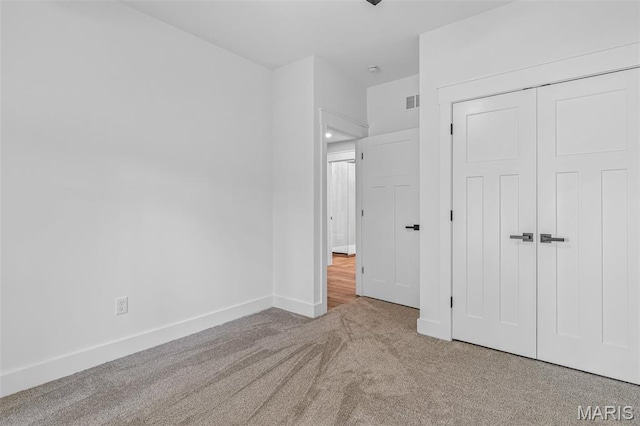 10028 Debbie Pl, Bonne Terre, MO 63628 - unfurnished bedroom featuring carpet and a closet