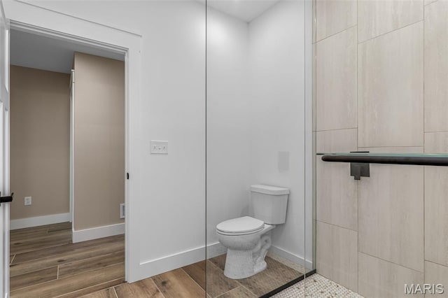10028 Debbie Pl, Bonne Terre, MO 63628 - full bathroom with wood finished floors and tiled shower