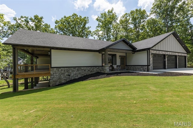 10028 Debbie Pl, Bonne Terre, MO 63628 - view of front facade with a front lawn, a garage, concrete driveway, and stone siding