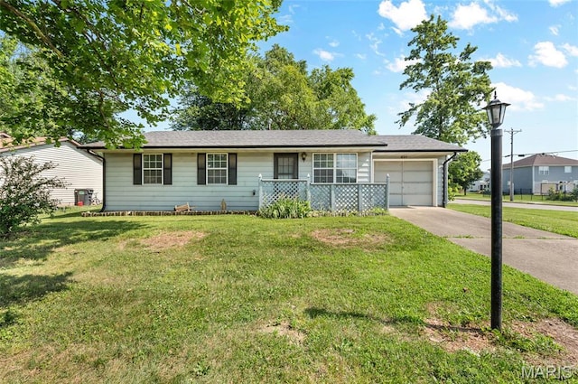 237 Perrottet Dr, Mascoutah, IL 62258 - ranch-style home featuring an attached garage, concrete driveway, and a front yard