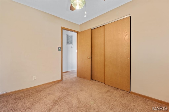 237 Perrottet Dr, Mascoutah, IL 62258 - unfurnished bedroom with carpet floors, a closet, and a ceiling fan